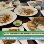 Indian food spread with biryani, curry, naan, rice and chutneys at Cilantro Indian Cafe.